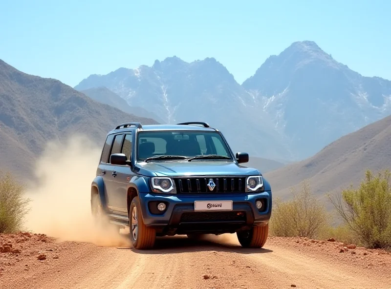 A Mahindra Scorpio N SUV driving on a dirt road with mountains in the background