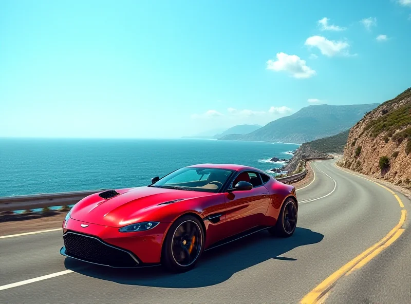 Aston Martin sports car driving on a scenic road.