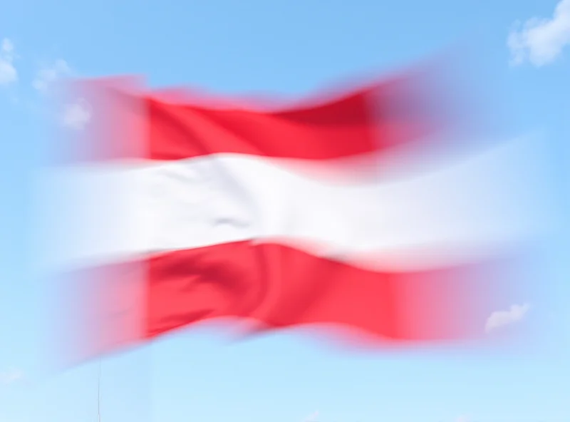 Image of the Austrian flag waving in the wind