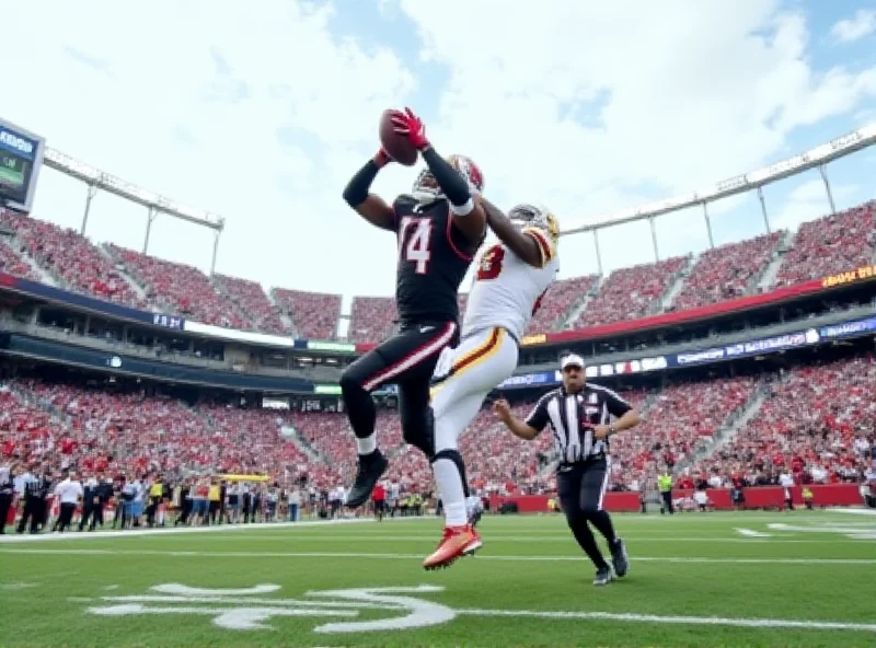 A wide receiver making a spectacular catch during an NFL game, with a defender closely guarding him.