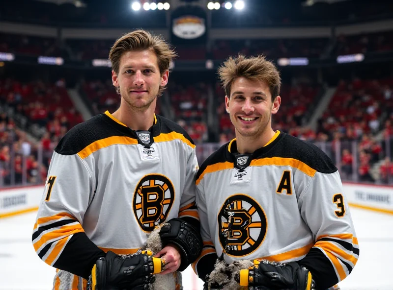 Jakub Lauko and Marat Khusnutdinov in Bruins jerseys