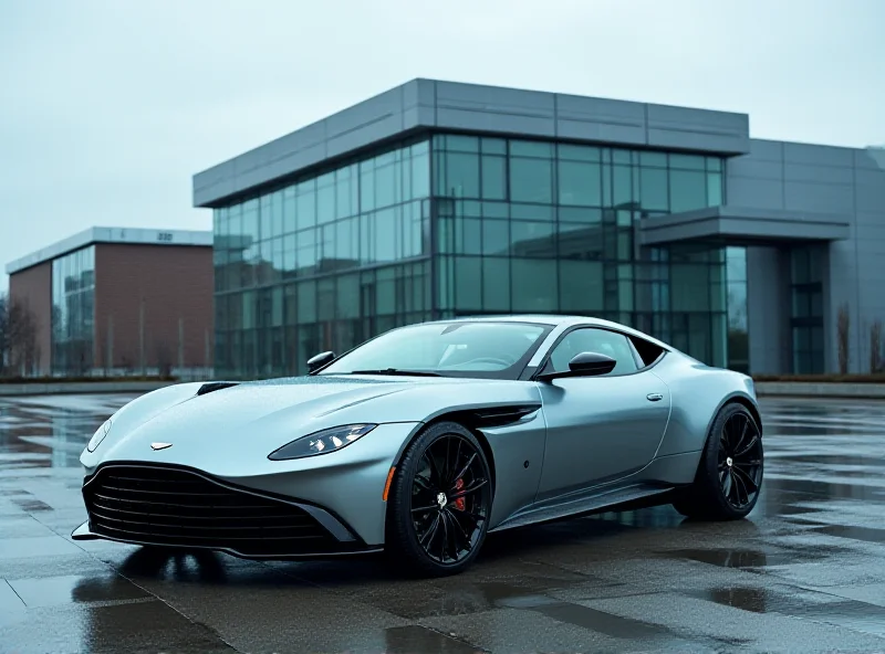 A sleek, silver Aston Martin sports car parked in front of a modern, glass building. The sky is overcast.