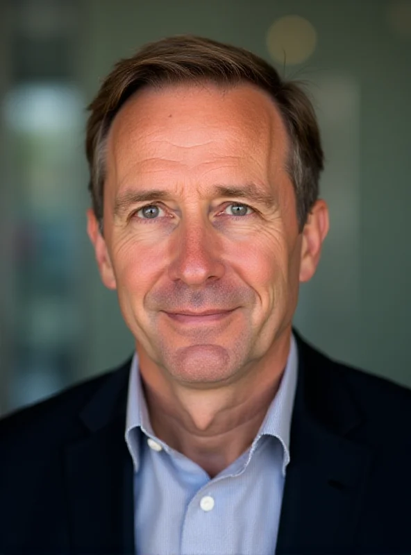 Professional headshot of Oliver Bäte, CEO of Allianz, looking directly at the camera with a serious expression.