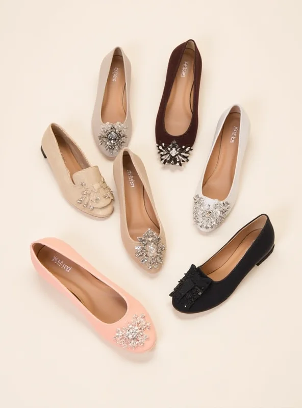 A collection of stylish dressy flats in various colors and designs, arranged on a neutral background.