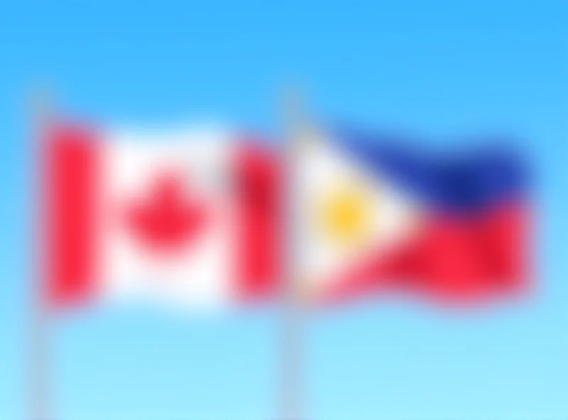 Canadian and Philippine flags waving side-by-side, representing the new military agreement.