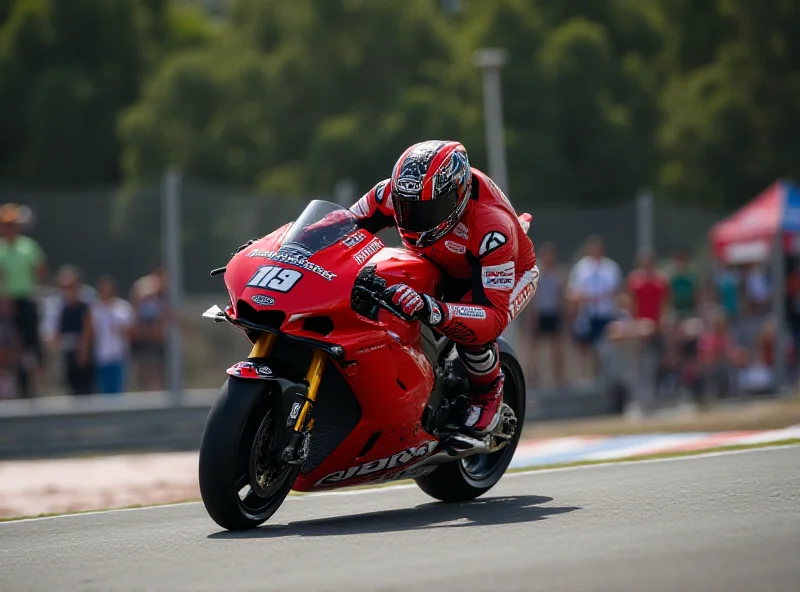 Marc Márquez leaning into a turn on a Ducati MotoGP bike during practice in Thailand.