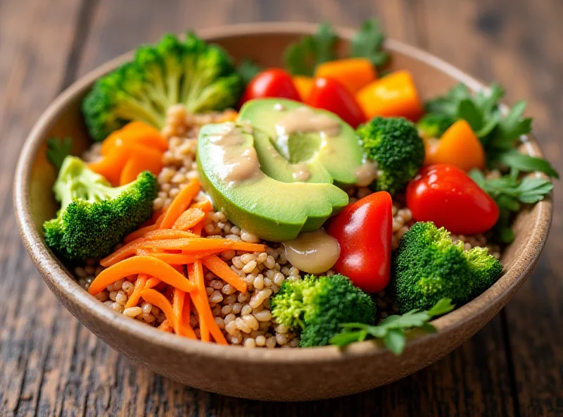 Close-up of a vibrant macro bowl with brown rice, colorful vegetables, and miso-tahini dressing.