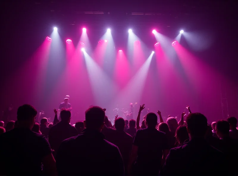 A vibrant stage with lights and a crowd in the background during an award ceremony