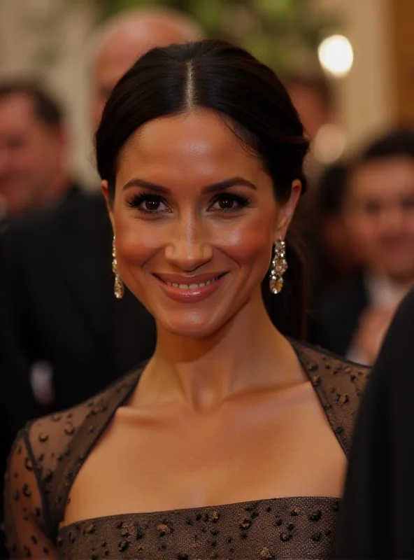 Meghan Markle smiling at an event, wearing elegant attire