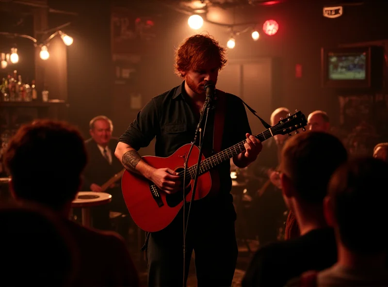 Ed Sheeran performing in a pub