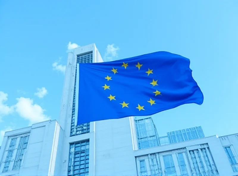 European Union flag waving in front of the Berlaymont building in Brussels.