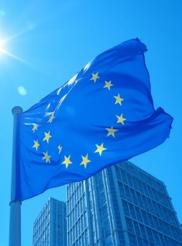 European Union flag waving in front of the Berlaymont building in Brussels.