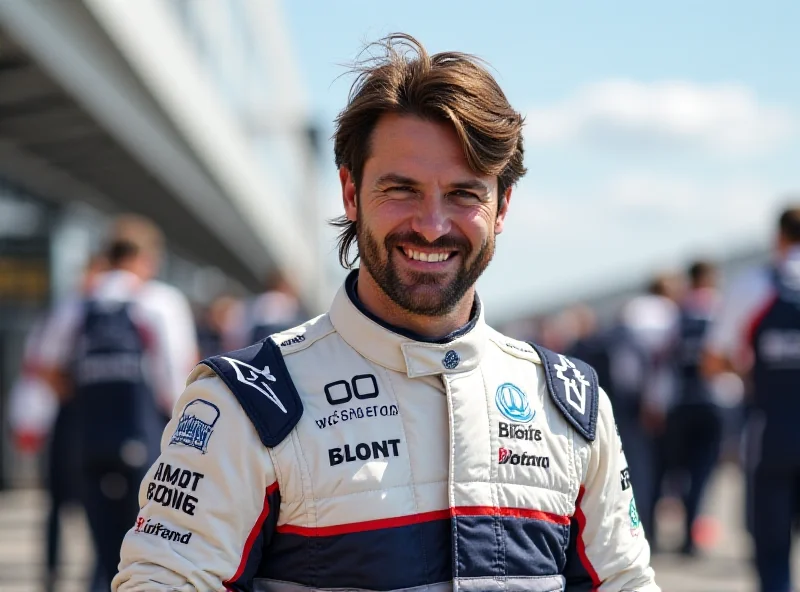 Carlos Sainz in his racing suit smiling after a successful preseason test with Williams.