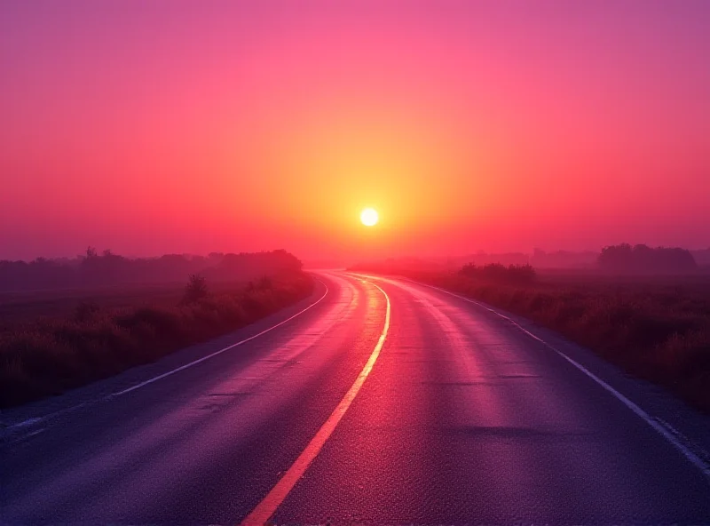 A winding road leading into a sunset, symbolizing the end of a journey and the beginning of a new one.