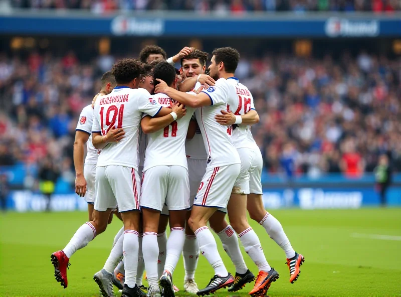 The Olympique Lyon team celebrating a goal on the field.