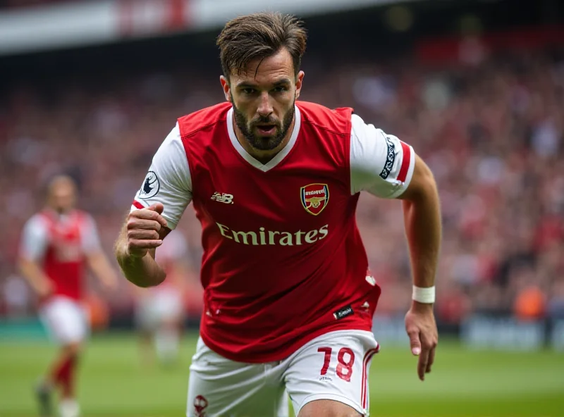 Jurrien Timber in an Arsenal jersey looking determined on the field