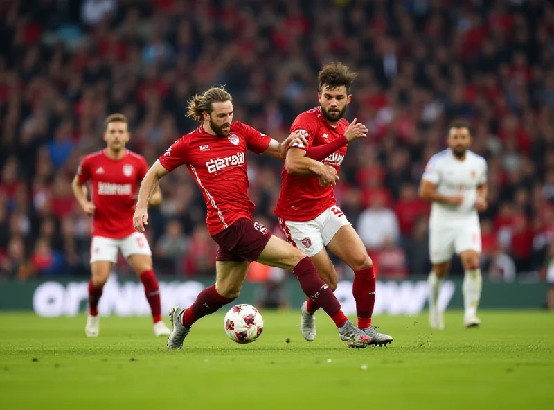 Andreas Hanche-Olsen challenges Ridle Baku during the Mainz vs. Leipzig match.