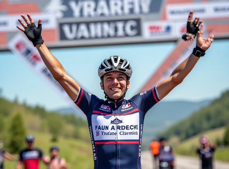 Image of Romain Gregoire celebrating a cycling victory, with the Faun Ardeche Classic logo visible in the background.