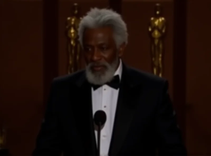 Morgan Freeman speaking at the Oscars during the In Memoriam segment.