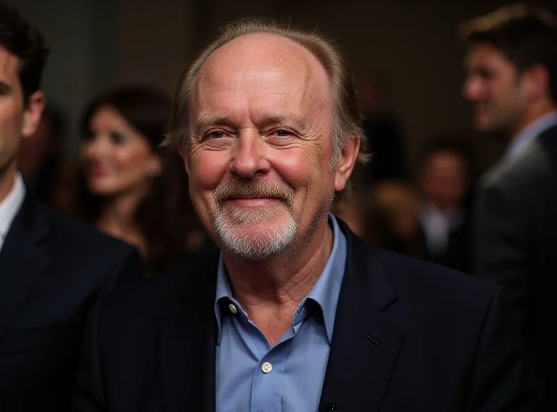 Gene Hackman smiling at an event.