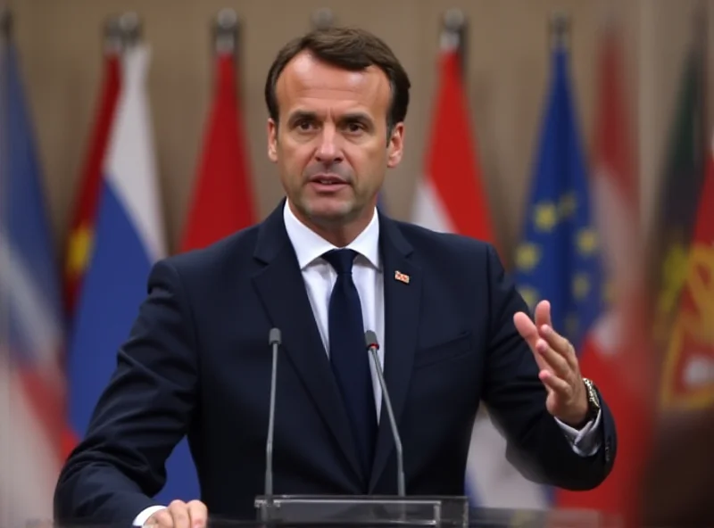 Emmanuel Macron speaking at a podium in Lisbon