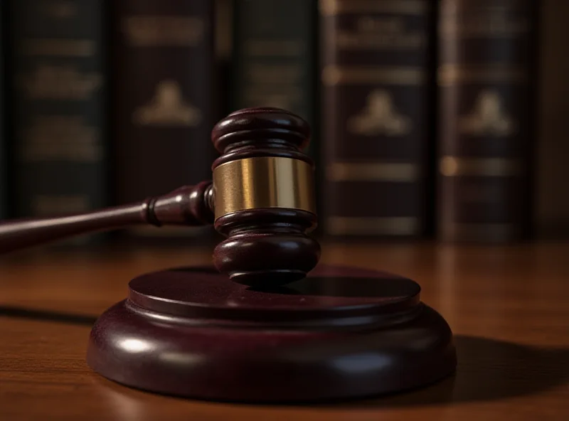 A gavel hitting a sounding block in a courtroom.