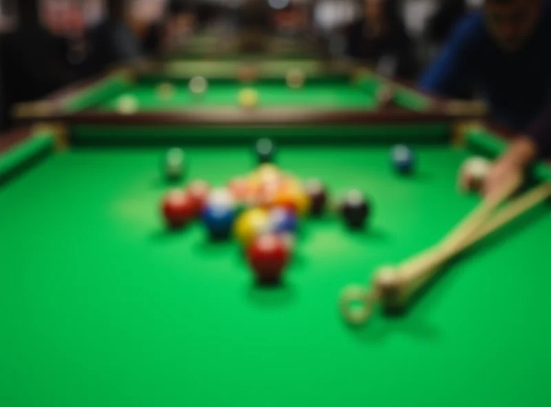 Snooker table with balls arranged for a game