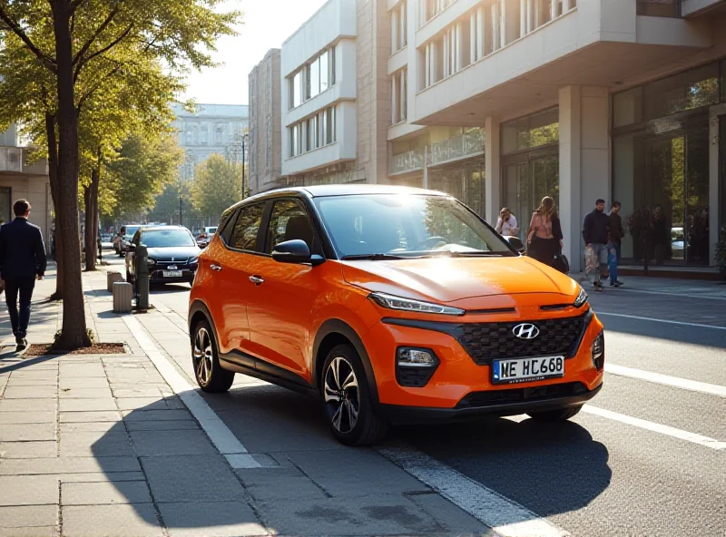 Hyundai Inster on a city street, showcasing its compact size and modern design.