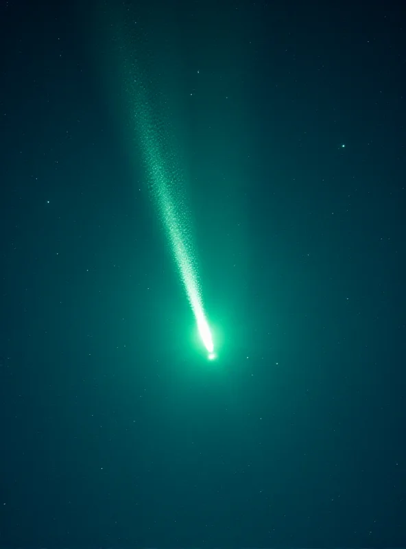 A stunning photograph of Comet 2024 G3 (ATLAS) in the night sky, showcasing its brilliant coma and long, sweeping tail.