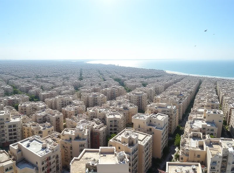 A wide shot of the Gaza Strip, showing densely populated urban areas and a coastal skyline.