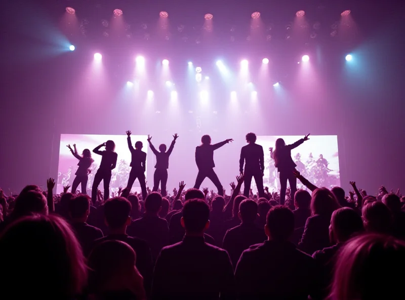 Blackpink performing on stage at a concert, with the crowd cheering.