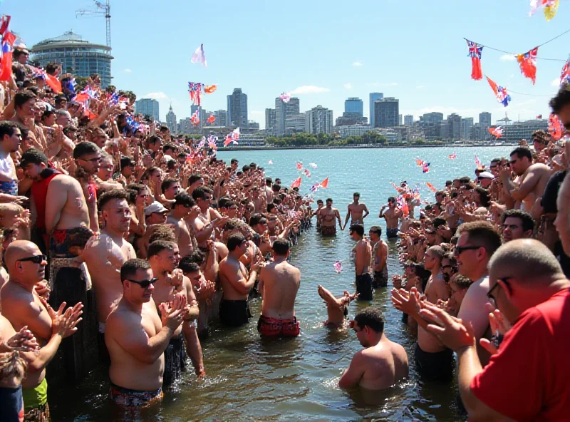 Crowd watching the Z Manu World Champs, cheering on the divers as they create massive splashes in the water in Auckland, New Zealand.