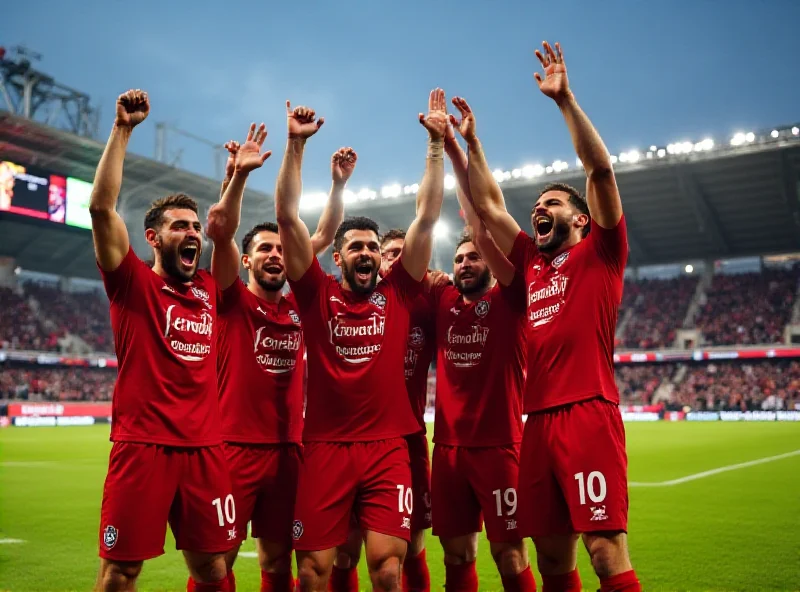 Bayer Leverkusen celebrating a goal against Eintracht Frankfurt.