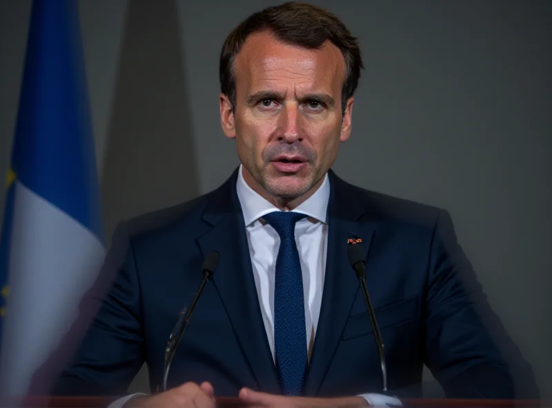 Emmanuel Macron speaking at a podium, serious expression