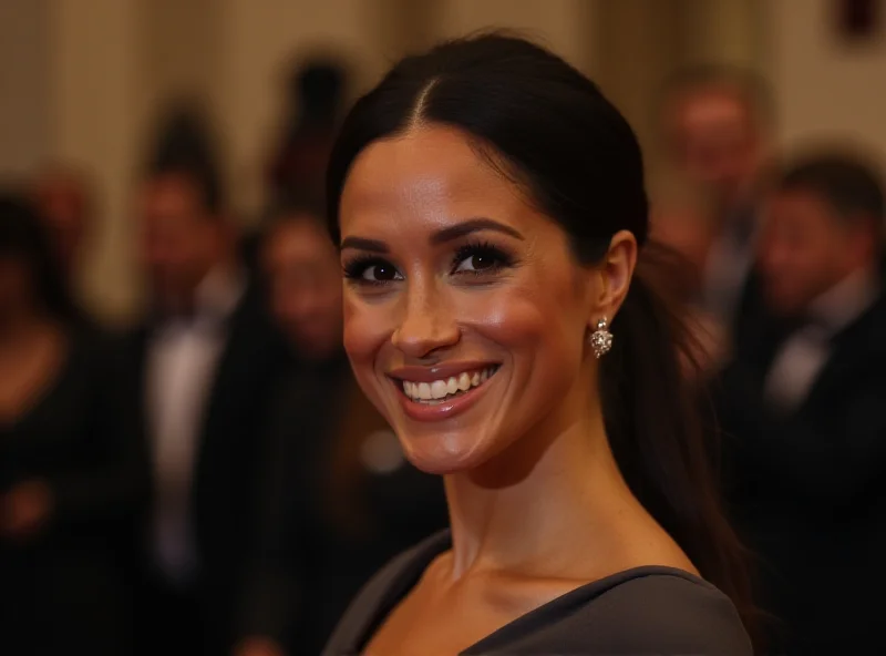 Meghan Markle smiling warmly at an event.