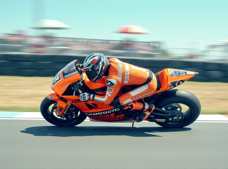 A generic racing motorcycle speeding down a track with blurred motion.