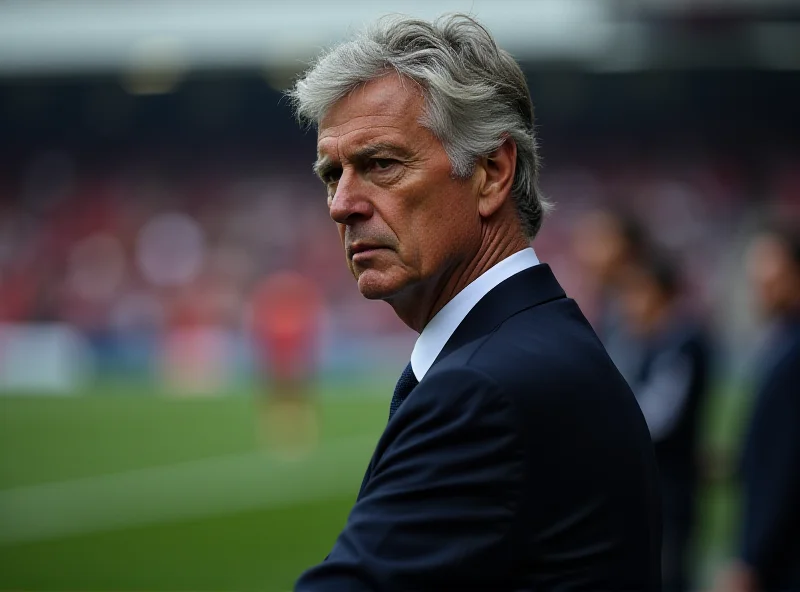 Jose Mourinho looking stern on the sidelines of a football match.