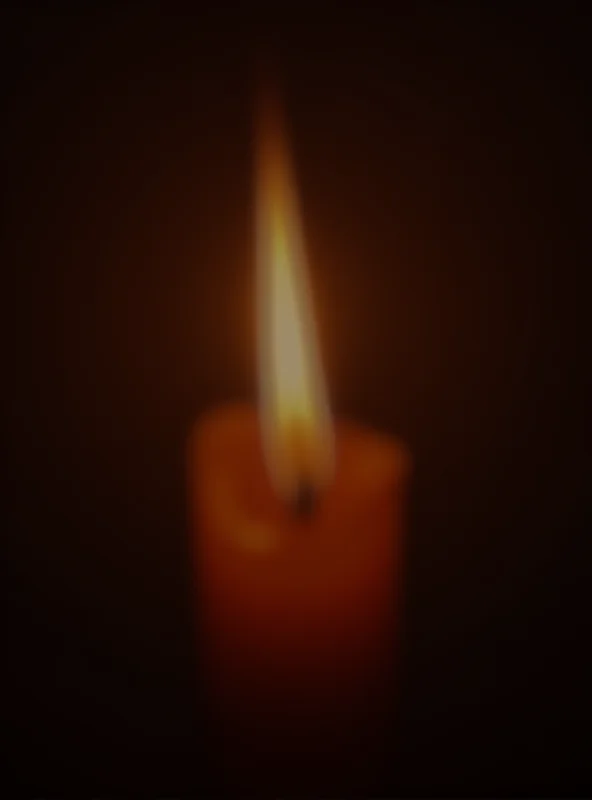 A close-up of a lit candle, representing remembrance and hope for justice in Demi Hannaway's case.