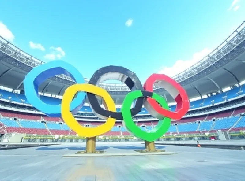 The Olympic rings in front of a stadium.