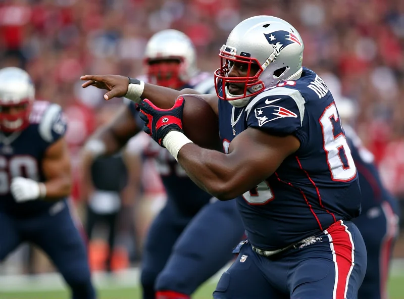 A football player blocking an opponent during a game.