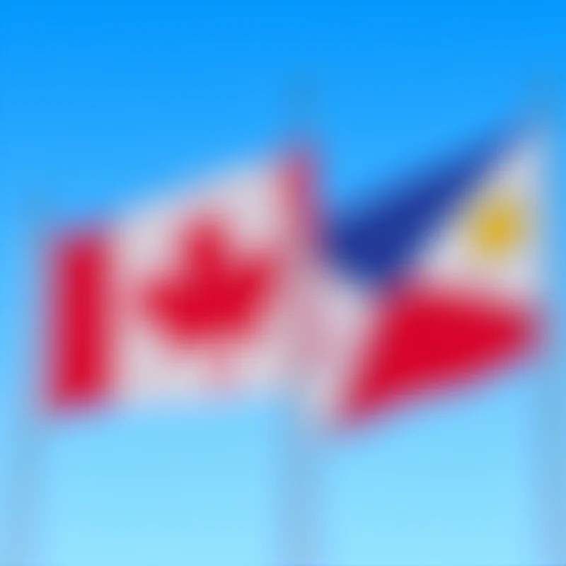 A high-angle shot of the flags of Canada and the Philippines waving side-by-side, symbolizing the alliance and partnership between the two countries.