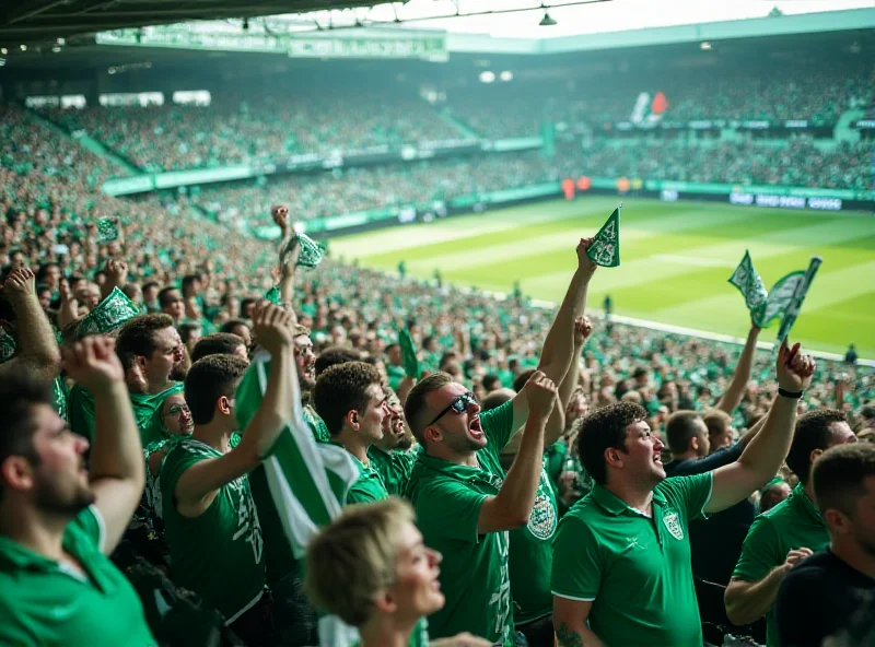 A packed football stadium with Plymouth Argyle fans cheering