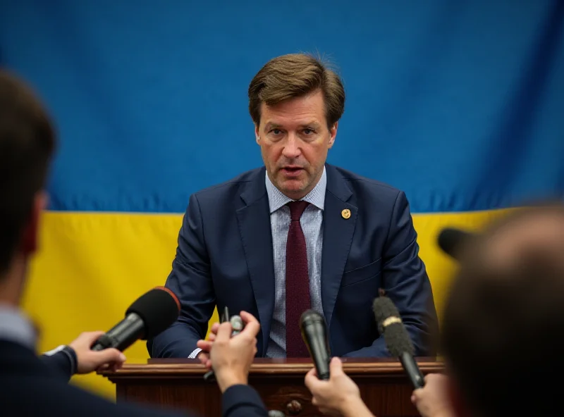 President Zelensky giving a press conference at a podium with the Ukrainian flag behind him.