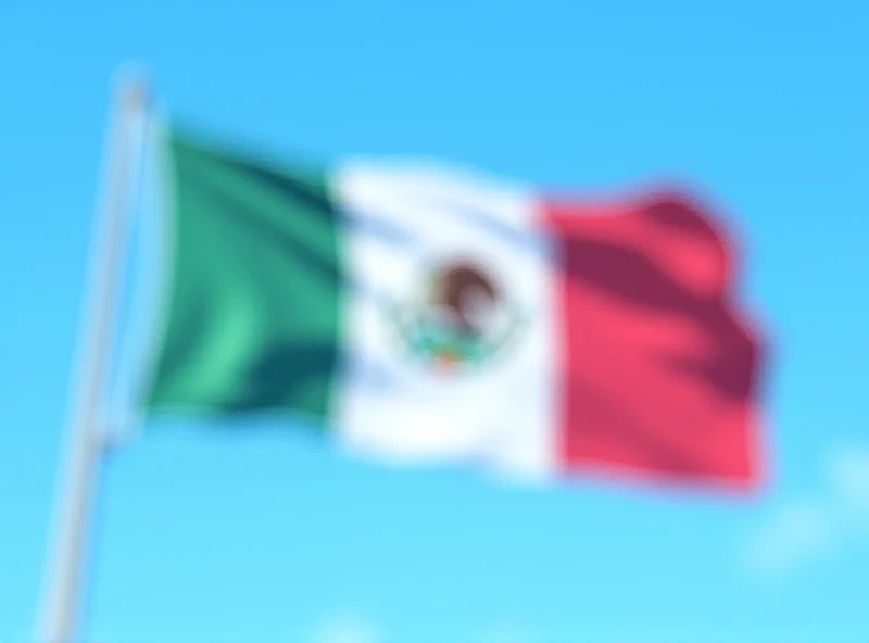 Image of the Mexican flag waving proudly.