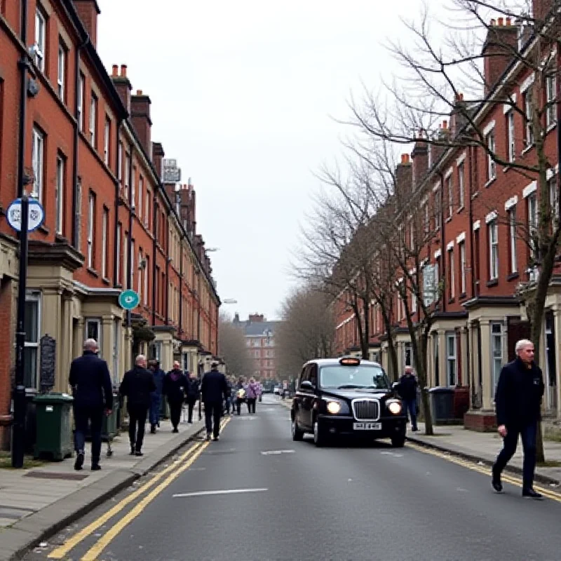 A typical street scene in Islington, North London, with red brick buildings.