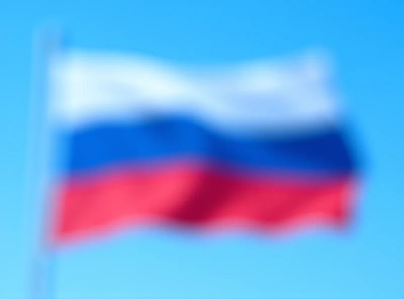 The Slovak flag waving in the wind, representing the country and its government.