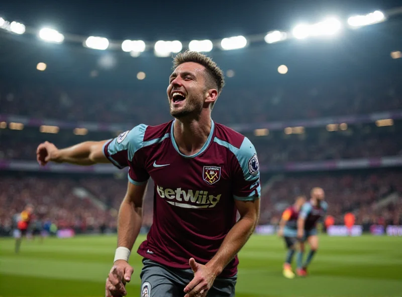 Tomáš Souček celebrating a goal on the field with teammates.