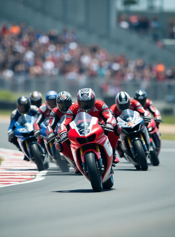 A dynamic shot of several motorcycles speeding around a race track. The bikes are brightly colored and the riders are leaning into the turns. The background shows a blurred crowd and grandstands, conveying the excitement of a racing event.