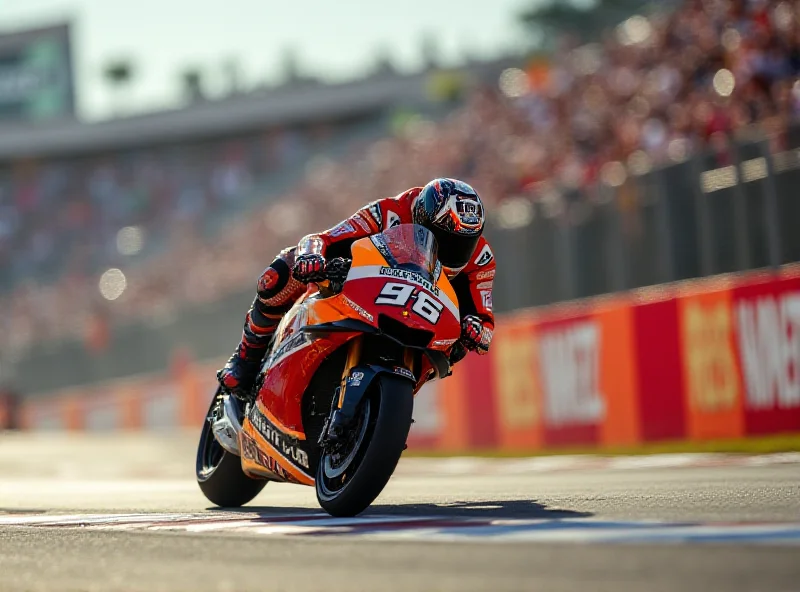 Jorge Martin on his MotoGP bike, racing on a track.