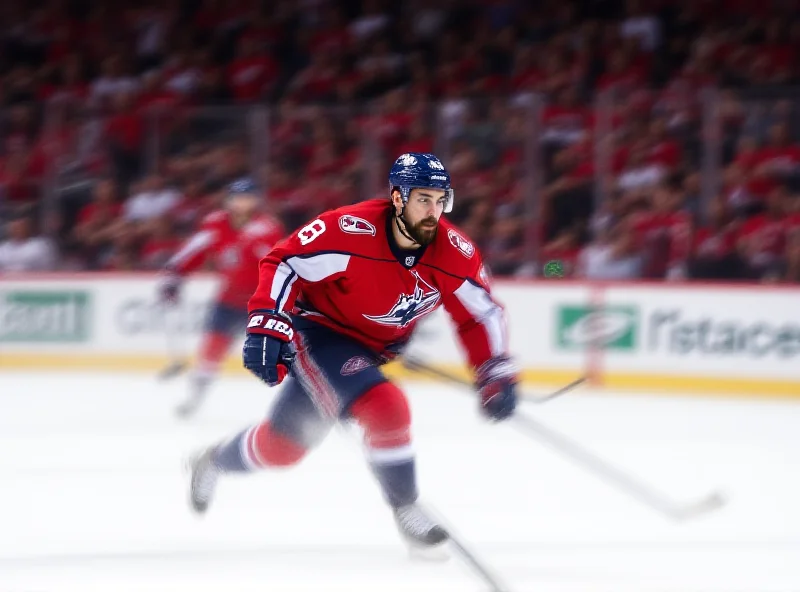 Alexander Ovechkin skating on ice, preparing to shoot the puck.